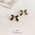 Gold Black Enamel Bow Stud Earrings Wavy Ribbon Pair view 3