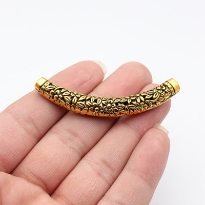 Front fingertip view of 花叶纹弯管珠 showing its visible shape and finish