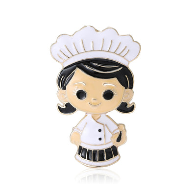 Front view of white uniform chef girl brooch against a white background.