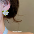 White Layered Flower Stud Earrings With Gold Tone Edges view 3