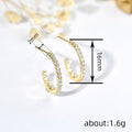 Gold Tone Open Hoop Earrings With Rows of Clear Stones view 4