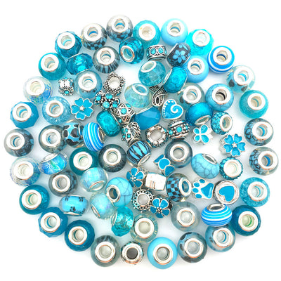 Blue bead beads arranged on a light background