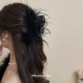Black Feather Hair Claw With Sheer Fabric Loops And Loose Strands view 4