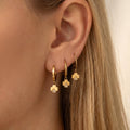 Crystal Four Leaf Flower Drop Hoop Earrings in Three Gold Tone Designs view 1