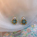 Pearl Stud Earrings With Blue And Gold Floral Enamel view 2