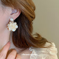 White Flower Cluster Stud Earrings With Pearl Look Centers view 3