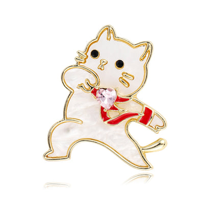 Front view of the white cat metal brooch
