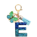 Blue Glitter Resin Letter Keychain with Butterfly Charm and Tassel view 9