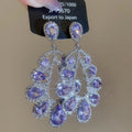 Silver Crystal Teardrop Cluster Stud Earrings with Polished Metal Details view 8