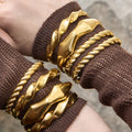 Sculpted Hinged Bangle Collection in Three Gold Tone Designs view 4