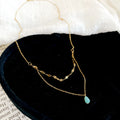 Gold Tone Layered Teardrop Pendant Necklace In Two Colors view 1
