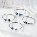 Silver Tone Blue Evil Eye Open Cuff Bracelets in Four Designs view 1