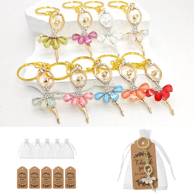 Assorted ballerina keychains with organza bags and kraft thank-you tags
