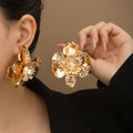 Sculpted Metallic Flower Pearl Look Statement Stud Earrings view 1