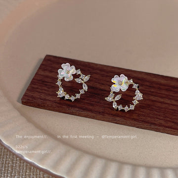 Gold Tone Clear Stone Wreath And Pale Blue Flower Stud Earrings