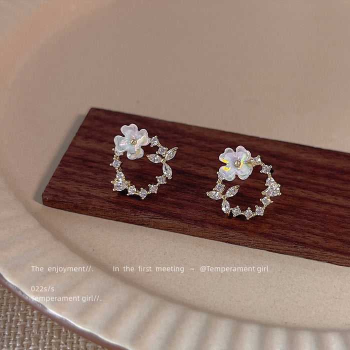 Gold Tone Clear Stone Wreath And Pale Blue Flower Stud Earrings