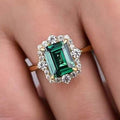 Emerald Green Rectangular Clear Stone Halo Ring In Gold Tone view 3