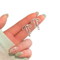 Silver Tone Openwork Bow Stud Earrings with Chain Tassels view 5