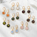 Gold Tone Rhinestone Round Pressed Flower Huggie Earrings in Nine Options view 1