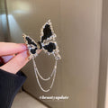 Black Butterfly Brooch With Silver Tone Edges And Draped Chains view 1