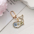 Gold Tone Pressed Flower Whale Resin Clip Keychains in Eight Designs view 2