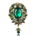 Antique Oval Crystal Dangle Brooch With Faceted Crystals And Polished Metal Details view 5