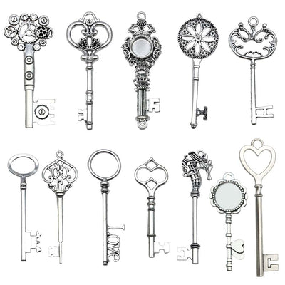 Antique silver assorted shape charms arranged on a light background