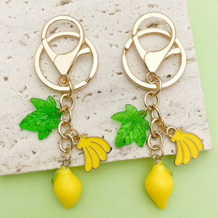 Strawberry, Cherry and Lemon Charm Keychains Featuring Yellow Lemon Across 43 Variations