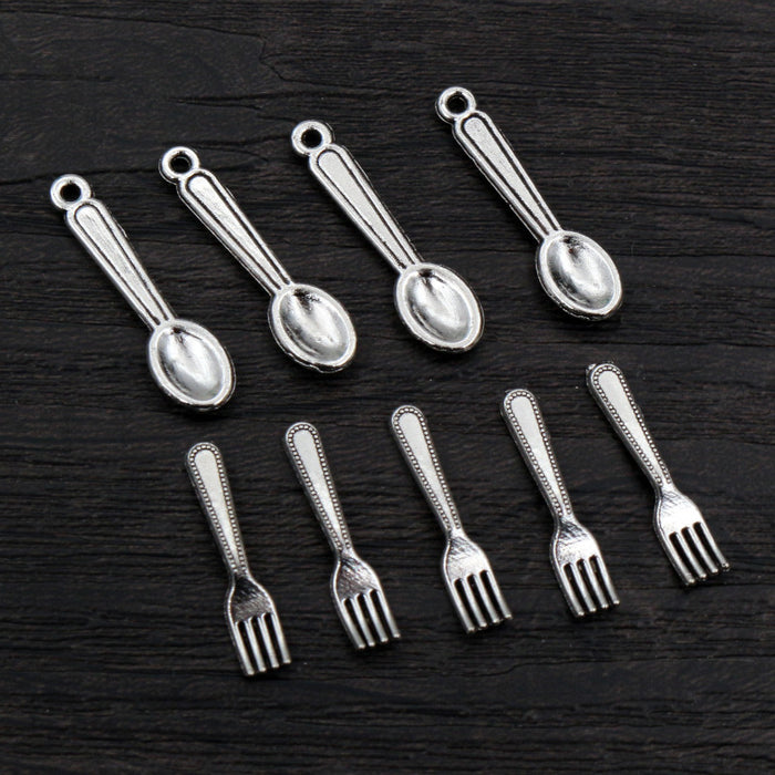 Miniature Spoon and Fork Pendant Charms in a Silver Tone