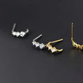 Three Clear Stone Curved Stud Earrings Silver and Gold Tones view 2