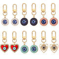 Twelve Piece Gold Tone Heart and Round Evil Eye Clip Keychain Set view 1