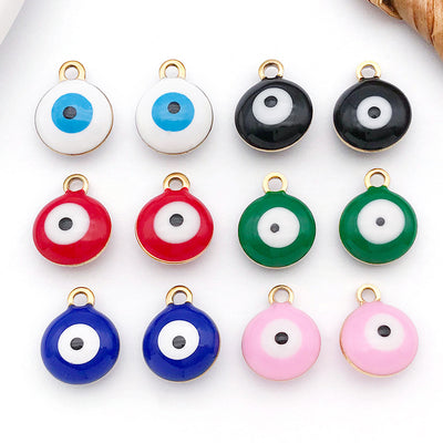 Colorful eye charms arranged on a light background