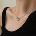Interlocking Open Heart Pendant Necklace in Gold Tone Finish view 2