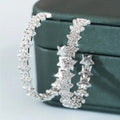 Silver Tone Star Stone Large Hoop Earrings with Clear Stone Accents view 3