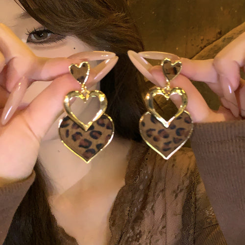 leopard print geometric drop earrings in three shapes shown in the main product view