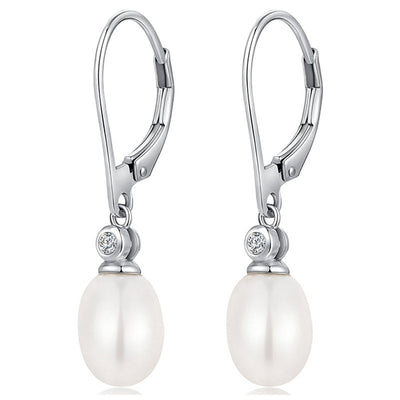 Silver lever-back oval pearl drop earrings on white background