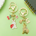 Easter Bunny Charm Keychains Featuring Pink Bow Across 19 Pictured Variations view 2
