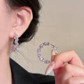Clear Crystal Floral Hoop Earrings in Polished Silver Tone view 3