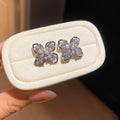 Crystal Four Petal Flower Stud Earrings in Two Metal Tones view 6