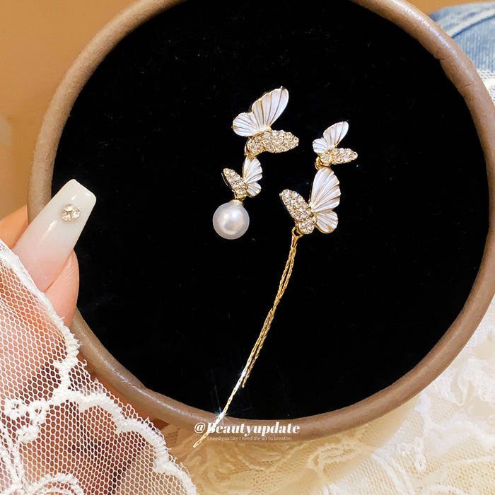 Asymmetric Butterfly Pearl And Chain Tassel Stud Earrings