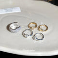 Crystal Pave Huggie Earrings in Three Metal Finishes view 2