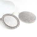 Oval Pendant Bezel Trays with Decorative Borders in Three Finishes view 3