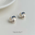 Gold Silver And Rose Tone Interlocking Knot Stud Earrings view 3