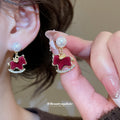 Red Flocked Horse and Pearl Drop Statement Stud Earrings view 1