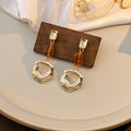 Gold Irregular Open Circle Drop Earrings Gray Stone Bead Accent view 2