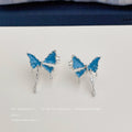 Silver Tone Blue Enamel Butterfly Stud Earrings Drip Edges view 1