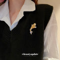 Gold Tone Crystal Fish Brooch With Pearl Like Orb Detail view 2