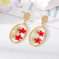 Gold Tone Oval Clear Resin Pressed Flower Drop Earrings view 3