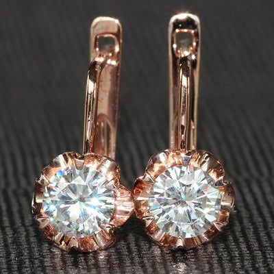 Rose gold leverback pair front view round clear stones scalloped settings