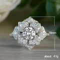 Silver Tone Layered Floral Cluster Statement Ring With Polished Clear Stone Detail view 3